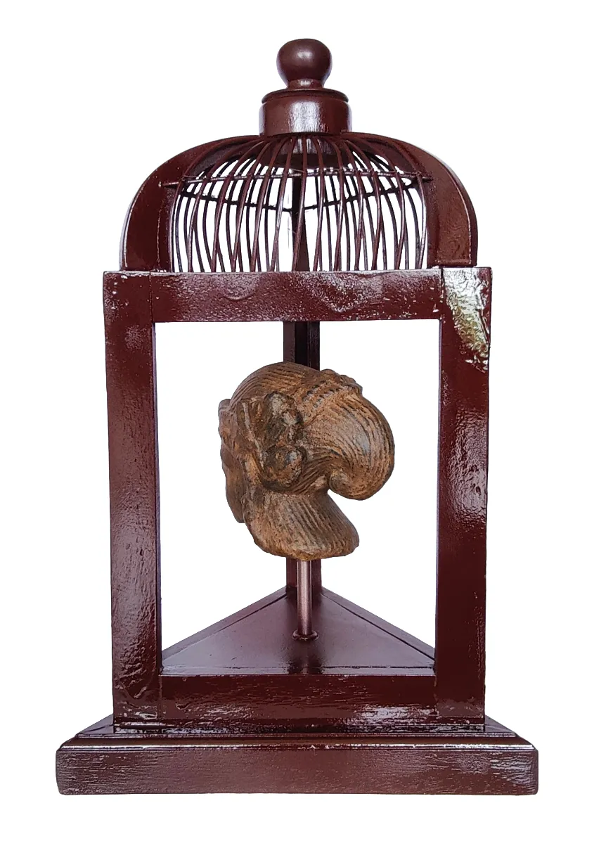 Home Decor: Table Accent. Unique Stone Dewi Bust Mounted in a open Bird Cage Frame.
